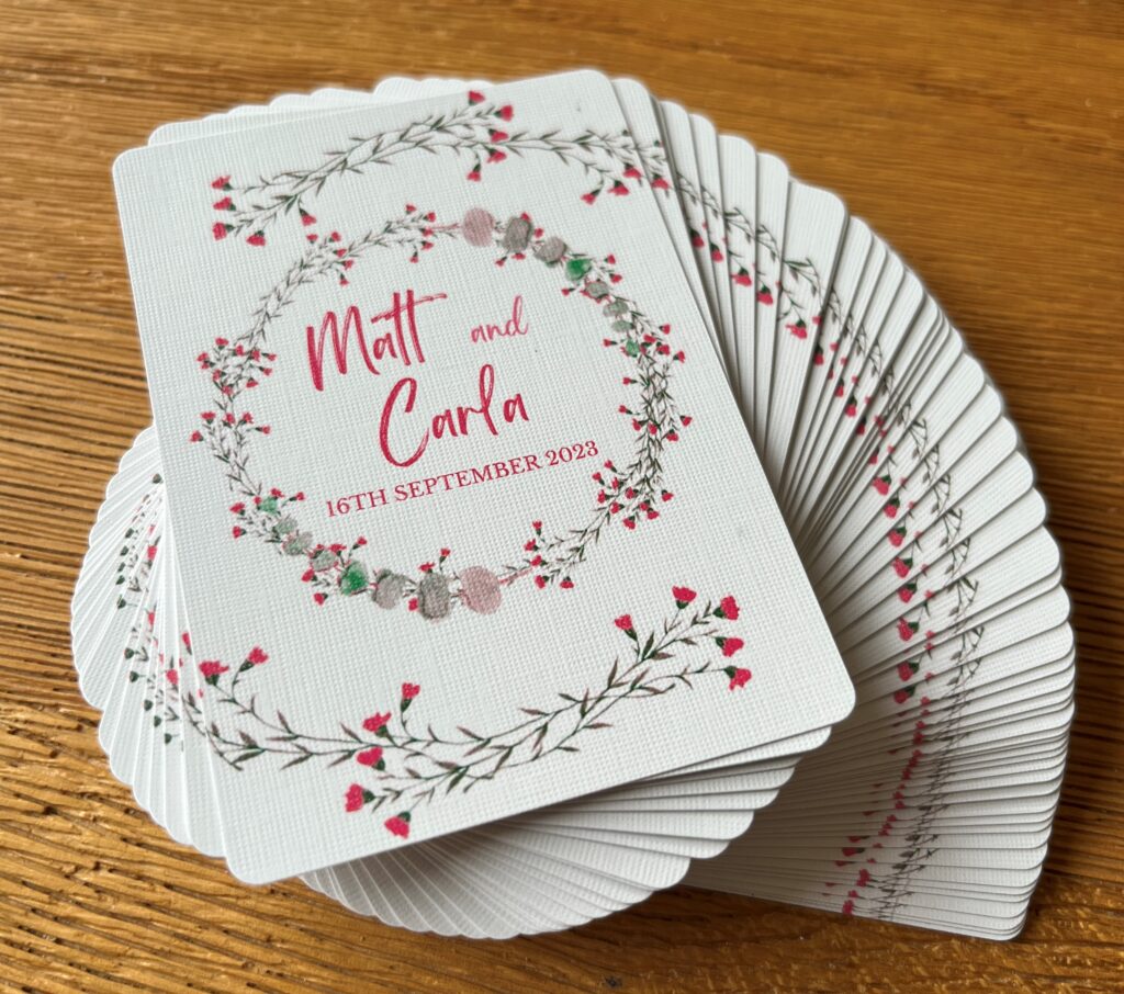 Personalised playing cards for wedding couple with their name and date on them