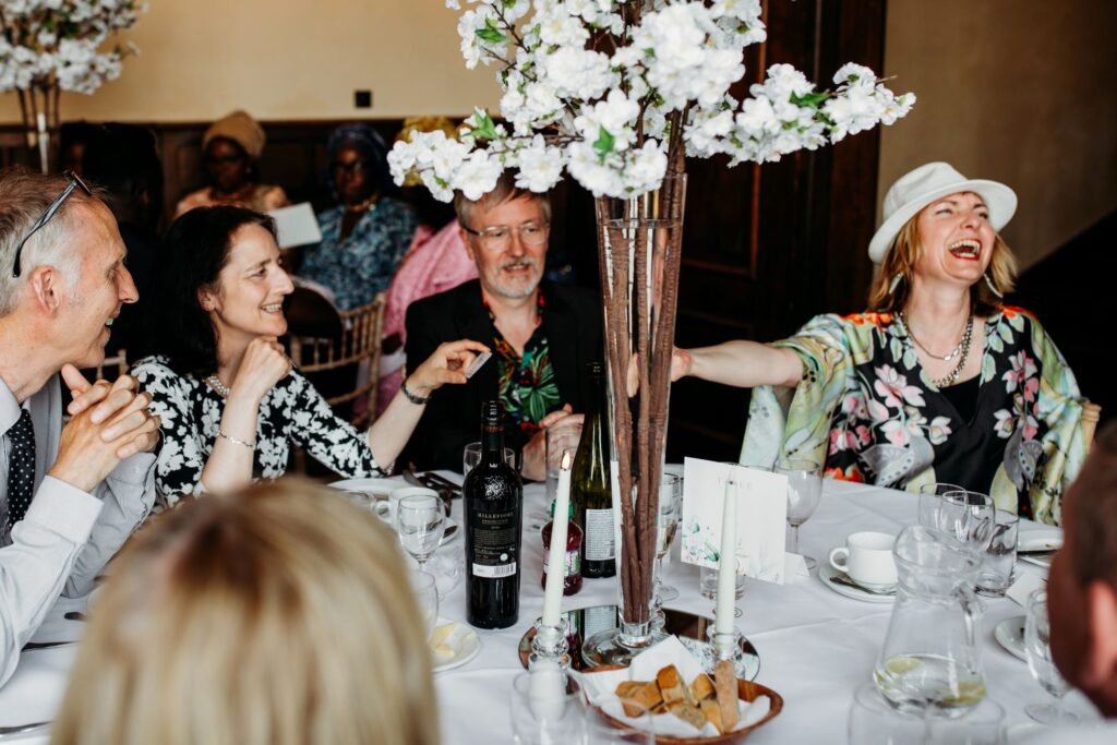 Wedding table magic performed between courses during wedding breakfast