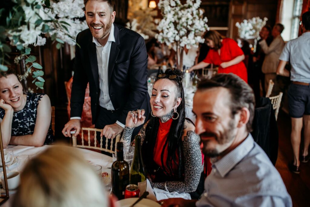Table magic performance for seated guests at stylish 40th birthday celebration