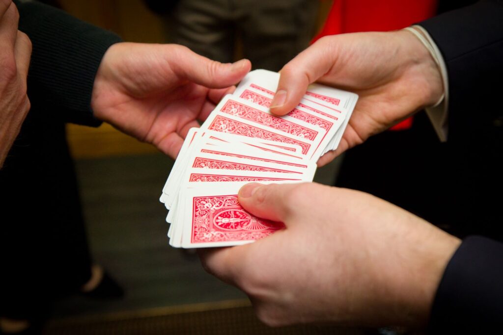 Deck of cards fanned out ready for guests to choose during Christmas party magic