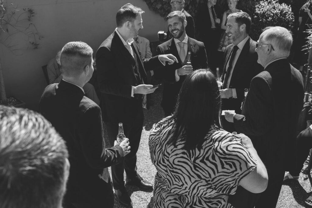 Richard Symes performing close-up magic for wedding guests at The Reid Rooms in Essex
